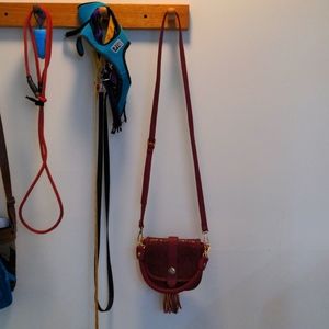 Red leather tooled handbag